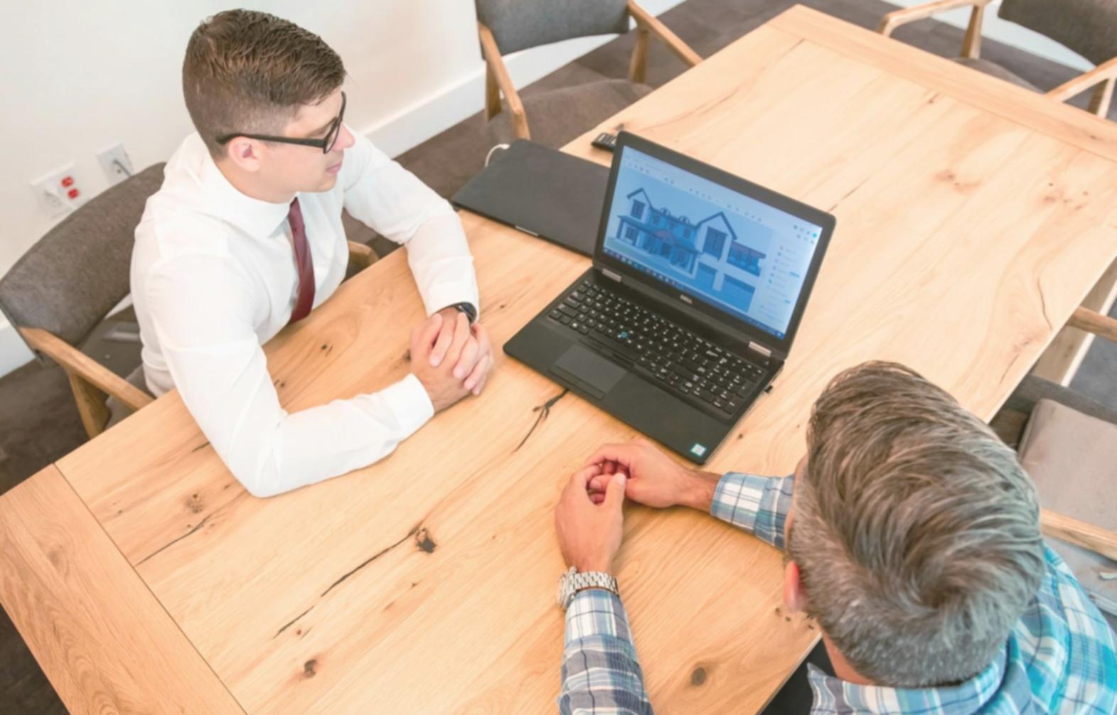 Financial professionals collaborating on complex modeling projects